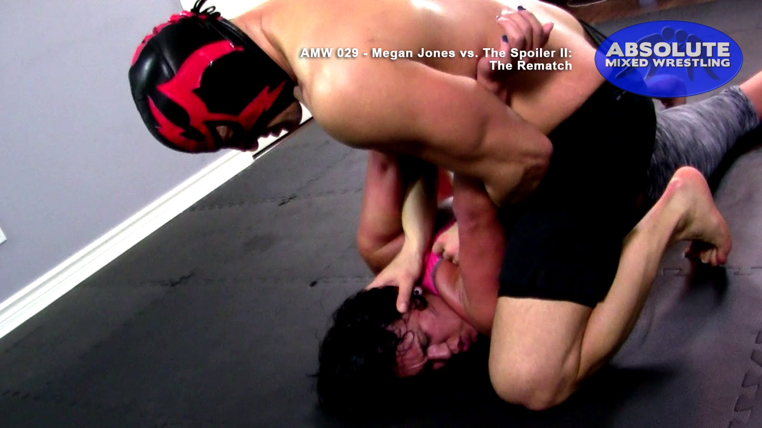 Megan Jones The Spoiler man vs woman intergender apartment submission Absolute Mixed Wrestling arm-bar